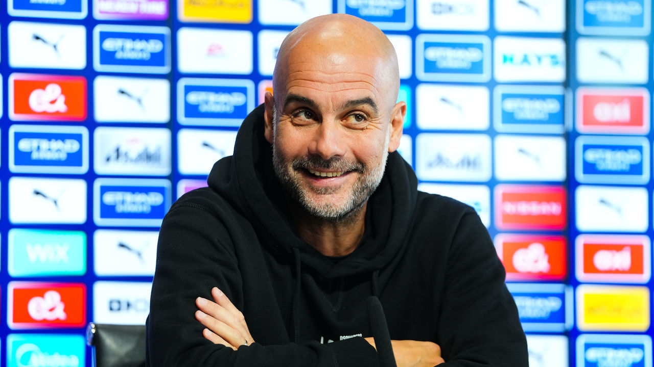 MANCHESTER, ENGLAND - DECEMBER 21: Manchester City's Pep Guardiola talks to the press ahead of Manchester City's clash with Liverpool in the Carabao Cup at Manchester City Football Academy on December 21, 2022 in Manchester, England.