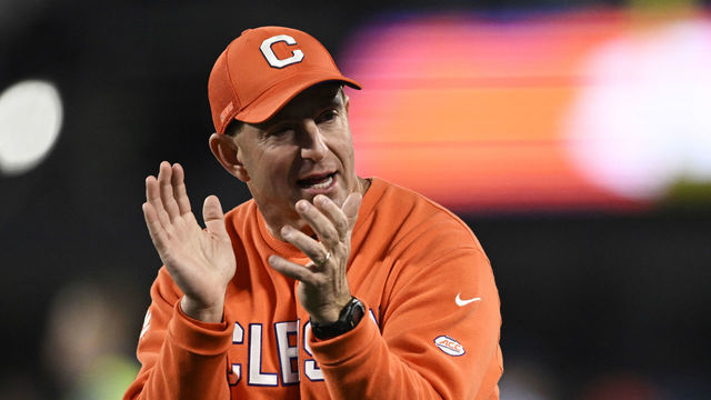 CHARLOTTE, NORTH CAROLINA - DECEMBER 03: Head coach Dabo Swinney of the Clemson Tigers talks to his team during warm ups before the ACC Championship game against the North Carolina Tar Heels at Bank of America Stadium on December 03, 2022 in Charlotte, North Carolina.