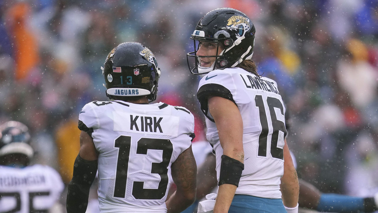 PHILADELPHIA, PA - OCTOBER 02: Christian Kirk #13 of the Jacksonville Jaguars talks to Trevor Lawrence #16 against the Philadelphia Eagles at Lincoln Financial Field on October 2, 2022 in Philadelphia, Pennsylvania.
