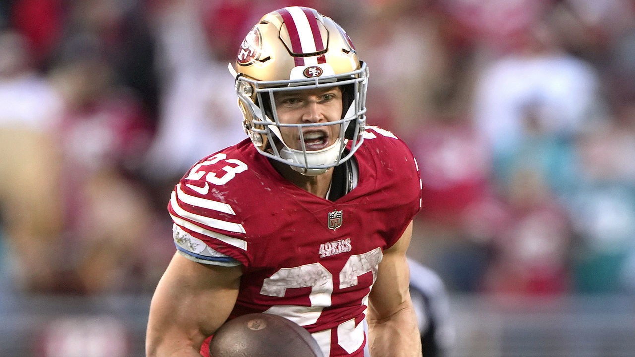 SANTA CLARA, CALIFORNIA - DECEMBER 04: Christian McCaffrey #23 of the San Francisco 49ers carries the ball against the Miami Dolphins during the fourth quarter of an NFL football game at Levi's Stadium on December 04, 2022 in Santa Clara, California.