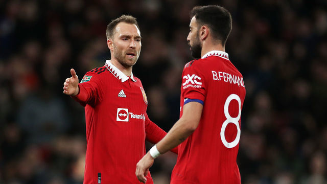 MANCHESTER, ENGLAND - DECEMBER 21: Christian Eriksen of Manchester United celebrates scoring their side's first goal with teammate Bruno Fernandes during the Carabao Cup Fourth Round match between Manchester United and Burnley at Old Trafford on December 21, 2022 in Manchester, England.
