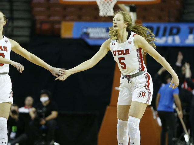 AUSTIN, TX - MARCH 18: Utah Utes guard Dru Gylten (10) and Utah Utes guard Gianna Kneepkens (5) celebrate after Gylten makes a shot against the Arkansas Razorbacks during the first round game of the 2022 NCAA Womens Basketball Tournament at the Frank Erwin Center in Austin, TX on March 18,2022.