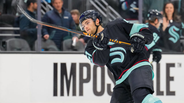 SEATTLE, WASHINGTON - DECEMBER 06: Shane Wright #51 of the Seattle Kraken warms up before a game against the Montreal Canadiens at Climate Pledge Arena on December 06, 2022 in Seattle, Washington.