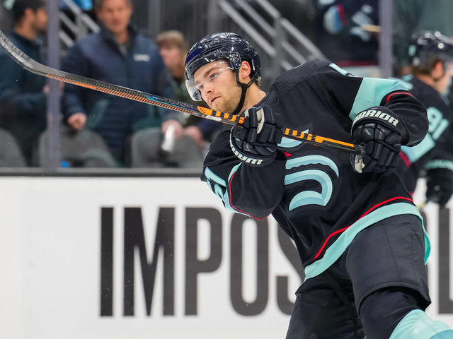 SEATTLE, WASHINGTON - DECEMBER 06: Shane Wright #51 of the Seattle Kraken warms up before a game against the Montreal Canadiens at Climate Pledge Arena on December 06, 2022 in Seattle, Washington.