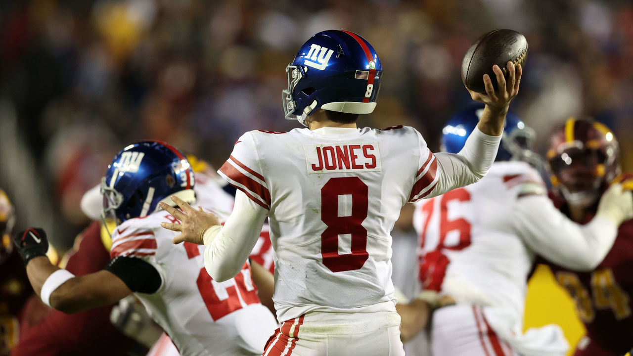 LANDOVER, MARYLAND - DECEMBER 18: Daniel Jones #8 of the New York Giants looks to pass the ball during the third quarter against the Washington Commanders at FedExField on December 18, 2022 in Landover, Maryland.