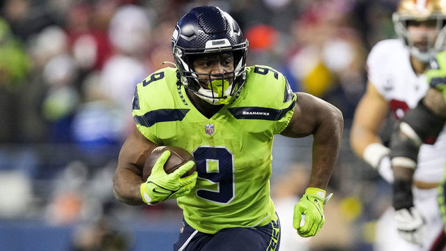 SEATTLE, WASHINGTON - DECEMBER 15: Kenneth Walker III #9 of the Seattle Seahawks carries the ball against the San Francisco 49ers during the fourth quarter of the game at Lumen Field on December 15, 2022 in Seattle, Washington.