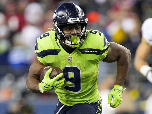 SEATTLE, WASHINGTON - DECEMBER 15: Kenneth Walker III #9 of the Seattle Seahawks carries the ball against the San Francisco 49ers during the fourth quarter of the game at Lumen Field on December 15, 2022 in Seattle, Washington.