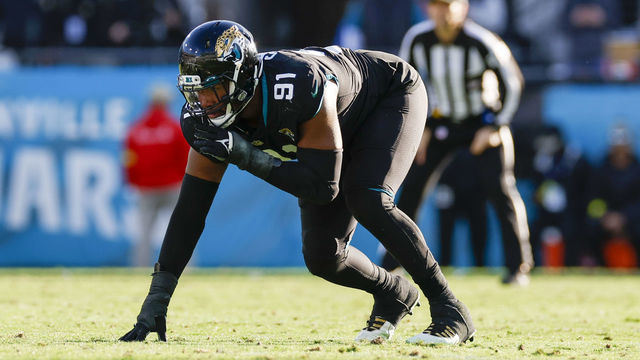 JACKSONVILLE, FL - DECEMBER 18: Jacksonville Jaguars defensive end Dawuane Smoot (91) lines up for a play during the game between the Dallas Cowboys and the Jacksonville Jaguars on December 18, 2022 at tIAA Bank Field in Jacksonville, Fl.