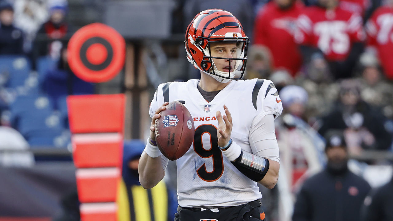 FOXBOROUGH, MASSACHUSETTS - DECEMBER 24: Joe Burrow #9 of the Cincinnati Bengals attempts a pass during the second quarter against the New England Patriots at Gillette Stadium on December 24, 2022 in Foxborough, Massachusetts.