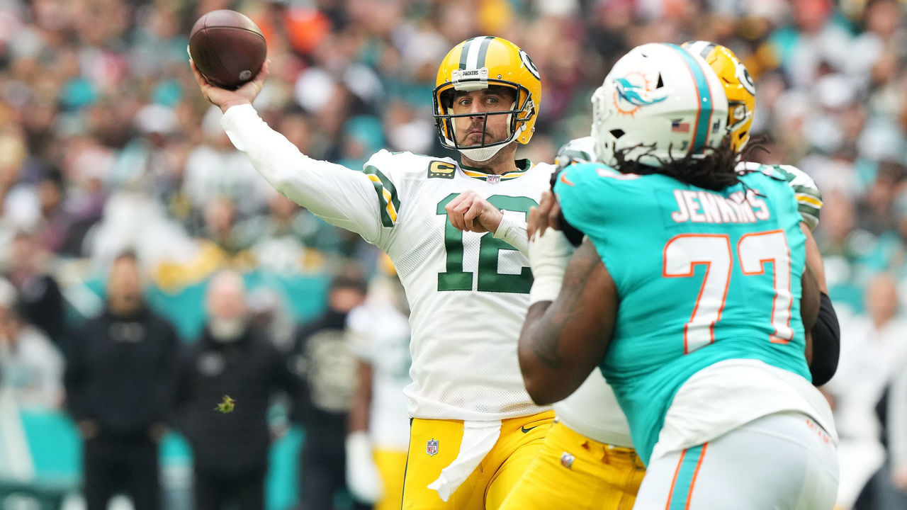 MIAMI GARDENS, FLORIDA - DECEMBER 25: Aaron Rodgers #12 of the Green Bay Packers throws a pass during the first quarter of the game against the Miami Dolphins at Hard Rock Stadium on December 25, 2022 in Miami Gardens, Florida.
