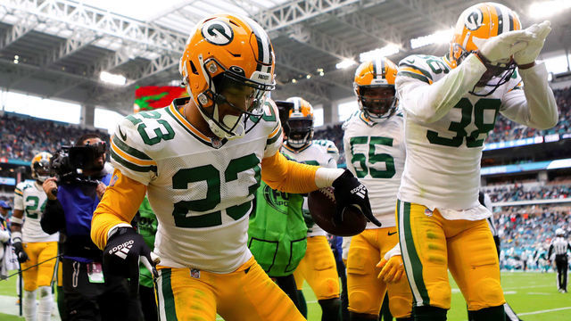 MIAMI GARDENS, FLORIDA - DECEMBER 25: Jaire Alexander #23 of the Green Bay Packers celebrates after an interception against the Miami Dolphins during the fourth quarter of the game at Hard Rock Stadium on December 25, 2022 in Miami Gardens, Florida.