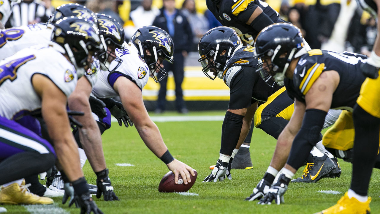 PITTSBURGH, PA - DECEMBER 11: The Baltimore Ravens offensive line stares down the Pittsburgh Steelers defensive line during the national football league game between the Baltimore Ravens and the Pittsburgh Steelers on December 11, 2022 at Acrisure Stadium in Pittsburgh, PA.