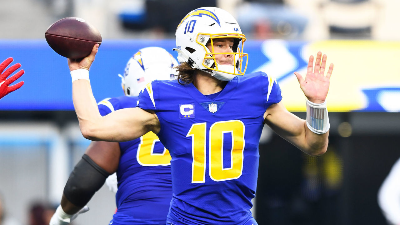 INGLEWOOD, CA - DECEMBER 18: Los Angeles Chargers quarterback Justin Herbert (10) throws a pass pass during the NFL regular season game between the Tennessee Titans and the Los Angeles Chargers on December 18, 2022, at SoFi Stadium in Inglewood, CA.