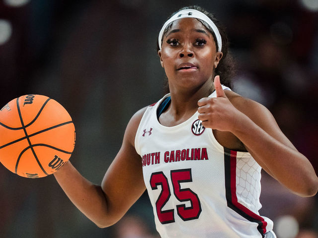 COLUMBIA, SOUTH CAROLINA - DECEMBER 11: Raven Johnson #25 of the South Carolina Gamecocks brings the ball up court against the Liberty Lady Flames during their game at Colonial Life Arena on December 11, 2022 in Columbia, South Carolina.