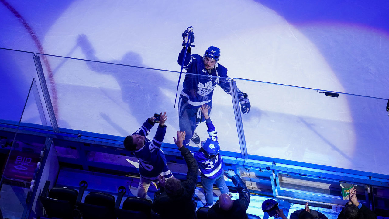 TORONTO, ON - DECEMBER 20: Auston Matthews #34 of the Toronto Maple Leafs gives a stick to a fan after receiving a star of the game after defeating the Tampa Bay Lightning at the Scotiabank Arena on December 20, 2022 in Toronto, Ontario, Canada.