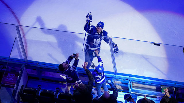 TORONTO, ON - DECEMBER 20: Auston Matthews #34 of the Toronto Maple Leafs gives a stick to a fan after receiving a star of the game after defeating the Tampa Bay Lightning at the Scotiabank Arena on December 20, 2022 in Toronto, Ontario, Canada.