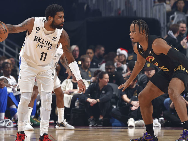 CLEVELAND, OH - DECEMBER 26: Kyrie Irving #11 of the Brooklyn Nets looks to pass the ball during the game against the Cleveland Cavaliers on December 26, 2022 at Rocket Mortgage FieldHouse in Cleveland, Ohio. NOTE TO USER: User expressly acknowledges and agrees that, by downloading and/or using this Photograph, user is consenting to the terms and conditions of the Getty Images License Agreement. Mandatory Copyright Notice: Copyright 2022 NBAE