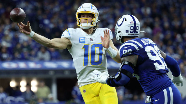 INDIANAPOLIS, INDIANA - DECEMBER 26: Justin Herbert #10 of the Los Angeles Chargers throws the ball against the Indianapolis Colts at Lucas Oil Stadium on December 26, 2022 in Indianapolis, Indiana.