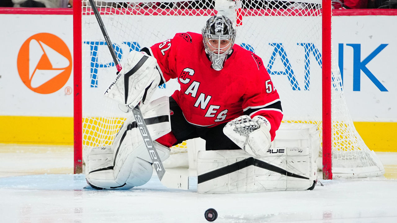 RALEIGH, NORTH CAROLINA - DECEMBER 18: Pyotr Kochetkov #52 of the Carolina Hurricanes tends net during the second period \ap at PNC Arena on December 18, 2022 in Raleigh, North Carolina.