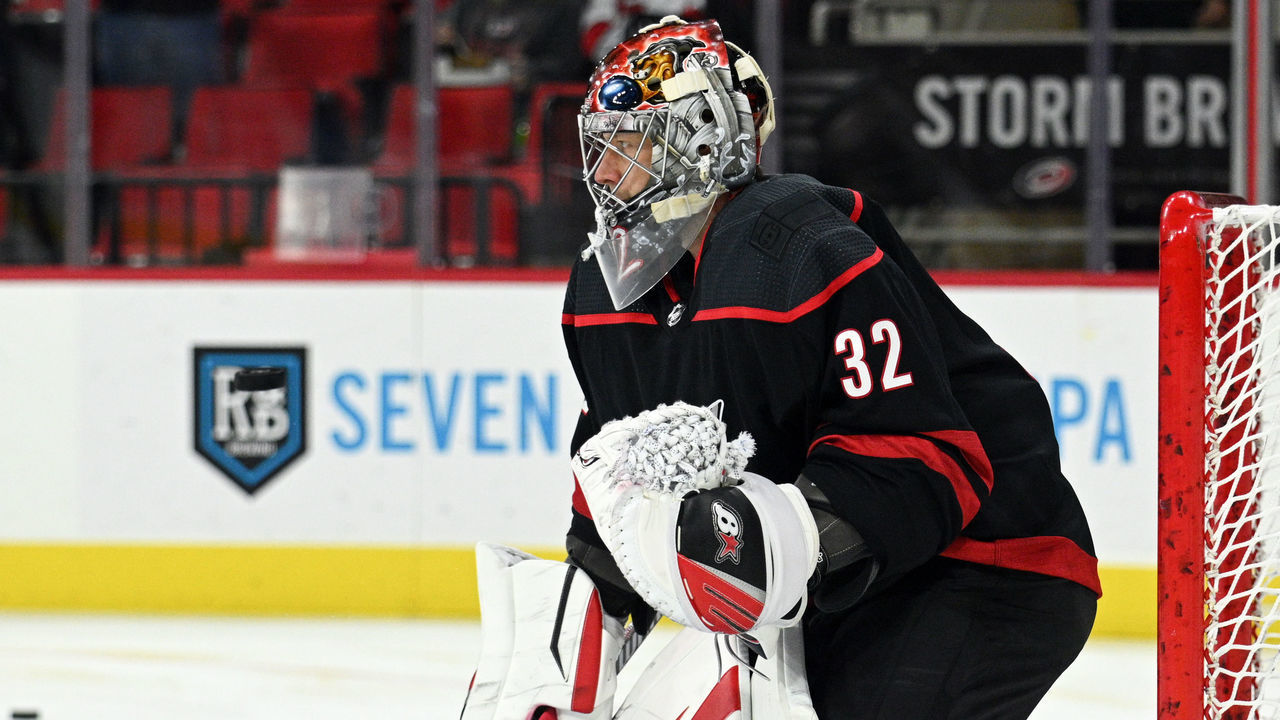 RALEIGH, NC - DECEMBER 27: Carolina Hurricanes Goalie Antti Raanta (32) faces shots during warmups prior to the game between the Chicago Blackhawks and the Carolina Hurricanes on December 27, 2022 at PNC Arena in Raleigh, North Carolina.