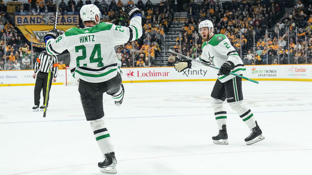 NASHVILLE, TENNESSEE - DECEMBER 27: Roope Hintz #24 celebrates his goal with Jani Hakanpää #2 of the Dallas Stars against the Nashville Predators during an NHL game at Bridgestone Arena on December 27, 2022 in Nashville, Tennessee.