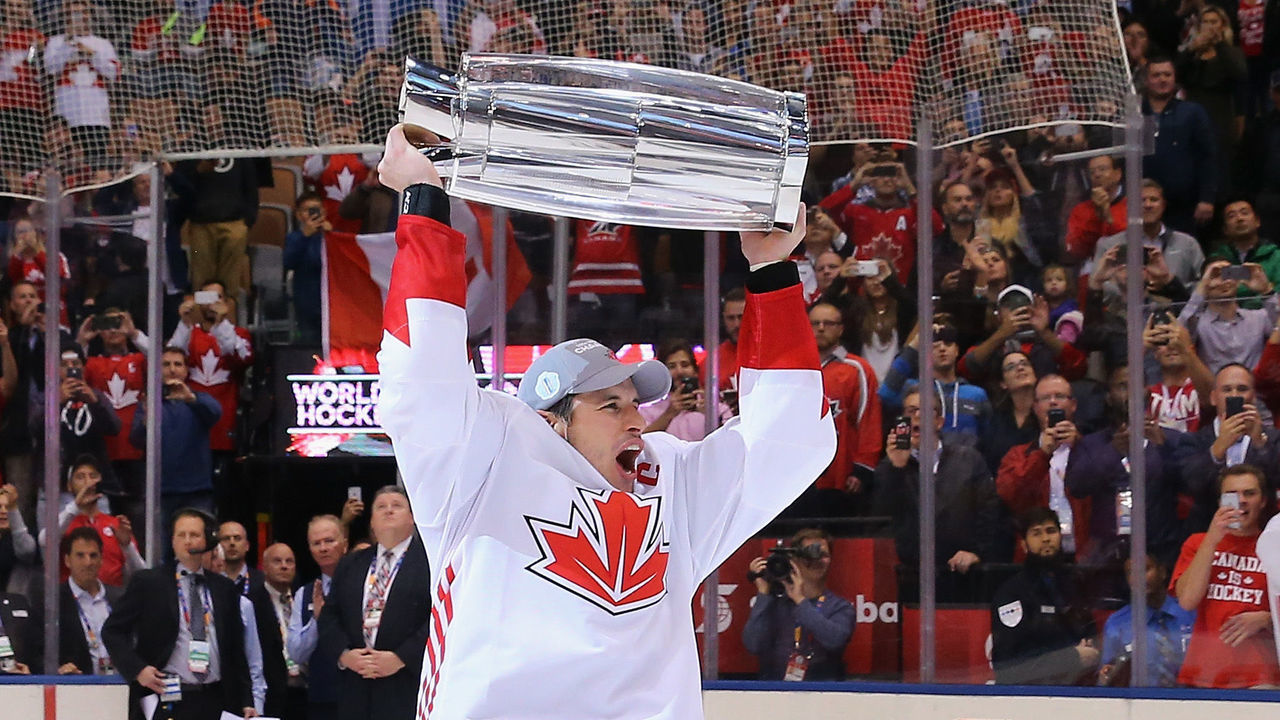 TORONTO, ON - SEPTEMBER 29: Sidney Crosby #87 of Team Canada carries the World Cup of Hockey Trophy after Canada defeated Europe 2-1 during Game Two of the World Cup of Hockey final series at the Air Canada Centre on September 29, 2016 in Toronto, Canada.