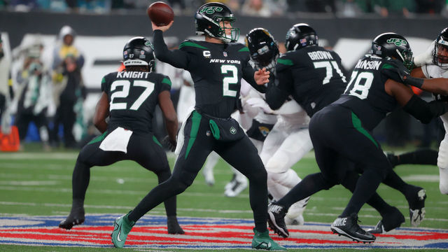 EAST RUTHERFORD, NJ - DECEMBER 22: New York Jets quarterback Zach Wilson (2) drops back to pass during the first quarter of the game between the New York Jets and the Jacksonville Jaguars on December 22, 2022 at MetLife Stadium in East Rutherford, New Jersey.