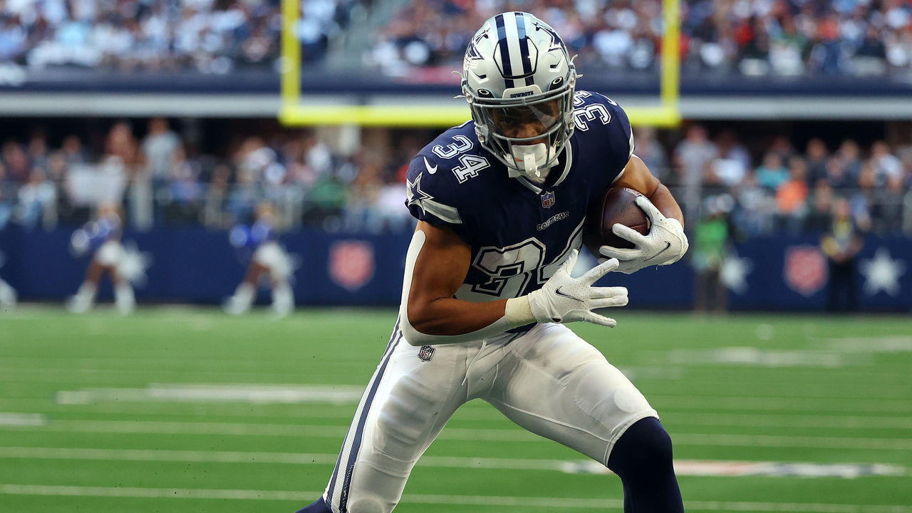 ARLINGTON, TEXAS - OCTOBER 30: Malik Davis #34 of the Dallas Cowboys runs the ball against the Chicago Bears at AT&T Stadium on October 30, 2022 in Arlington, Texas.