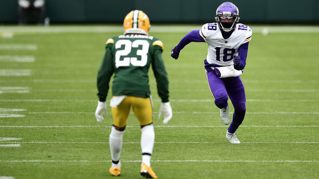GREEN BAY, WISCONSIN - NOVEMBER 01: Justin Jefferson #18 of the Minnesota Vikings works against Jaire Alexander #23 of the Green Bay Packers during a game at Lambeau Field on November 01, 2020 in Green Bay, Wisconsin. The Vikings defeated the Packers 28-22.