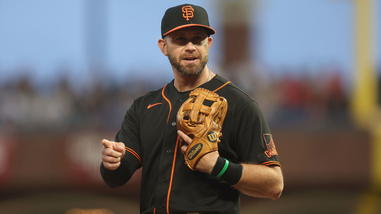 SAN FRANCISCO, CALIFORNIA - SEPTEMBER 17: Third baseman Evan Longoria #10 of the San Francisco Giants reacts after Will Smith #16 of the Los Angeles Dodgers hit a single down the third base line at Oracle Park on September 17, 2022 in San Francisco, California.