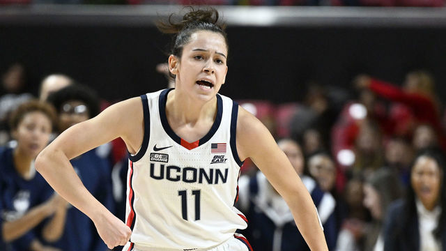 COLLEGE PARK, MARYLAND - DECEMBER 11: Lou Lopez-Senechal #11 of the UConn Huskies celebrates during the game against the Maryland Terrapins at Xfinity Center on December 11, 2022 in College Park, Maryland.