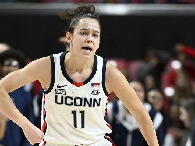COLLEGE PARK, MARYLAND - DECEMBER 11: Lou Lopez-Senechal #11 of the UConn Huskies celebrates during the game against the Maryland Terrapins at Xfinity Center on December 11, 2022 in College Park, Maryland.