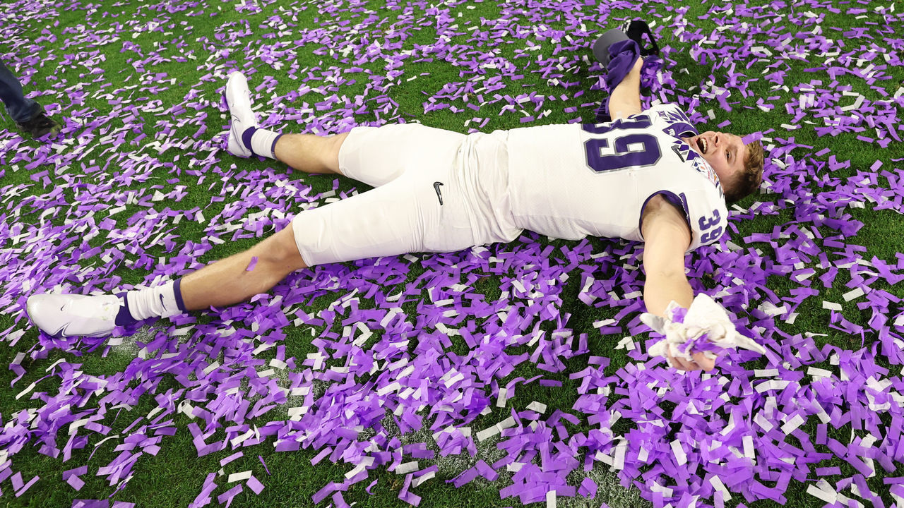GLENDALE, ARIZONA - DECEMBER 31: Matthew Kerr #39 of the TCU Horned Frogs celebrates after defeating the Michigan Wolverines in the Vrbo Fiesta Bowl at State Farm Stadium on December 31, 2022 in Glendale, Arizona.