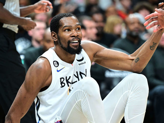 ATLANTA, GA - DECEMBER 28: Kevin Durant #7 of the Brooklyn Nets is helped up during the game against the Atlanta Hawks on December 28, 2022 at State Farm Arena in Atlanta, Georgia. NOTE TO USER: User expressly acknowledges and agrees that, by downloading and/or using this Photograph, user is consenting to the terms and conditions of the Getty Images License Agreement. Mandatory Copyright Notice: Copyright 2022 NBAE