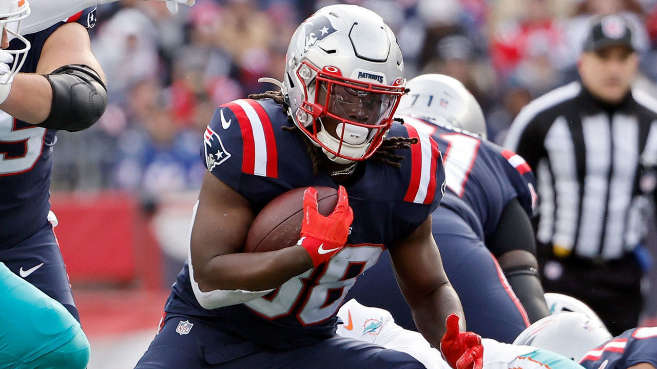 FOXBOROUGH, MASSACHUSETTS - JANUARY 01: Rhamondre Stevenson #38 of the New England Patriots runs against the Miami Dolphins during the first half at Gillette Stadium on January 01, 2023 in Foxborough, Massachusetts.