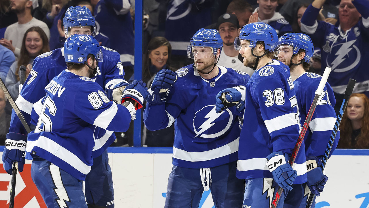 TAMPA, FL - DECEMBER 31: Steven Stamkos #91 of the Tampa Bay Lightning celebrates a goal with teammates Nikita Kucherov #86, Victor Hedman #77, Brandon Hagel #38, and Brayden Point #21 against the Arizona Coyotes during the second period at Amalie Arena on December 31, 2022 in Tampa, Florida.