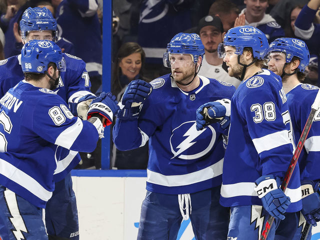 TAMPA, FL - DECEMBER 31: Steven Stamkos #91 of the Tampa Bay Lightning celebrates a goal with teammates Nikita Kucherov #86, Victor Hedman #77, Brandon Hagel #38, and Brayden Point #21 against the Arizona Coyotes during the second period at Amalie Arena on December 31, 2022 in Tampa, Florida.
