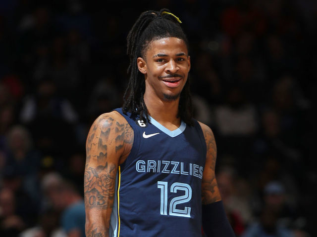 MEMPHIS, TN - JANUARY 1: Ja Morant #12 of the Memphis Grizzlies smiles during the game against the Sacramento Kings on January 1, 2023 at FedExForum in Memphis, Tennessee. Mandatory Copyright Notice: Copyright 2022 NBAE