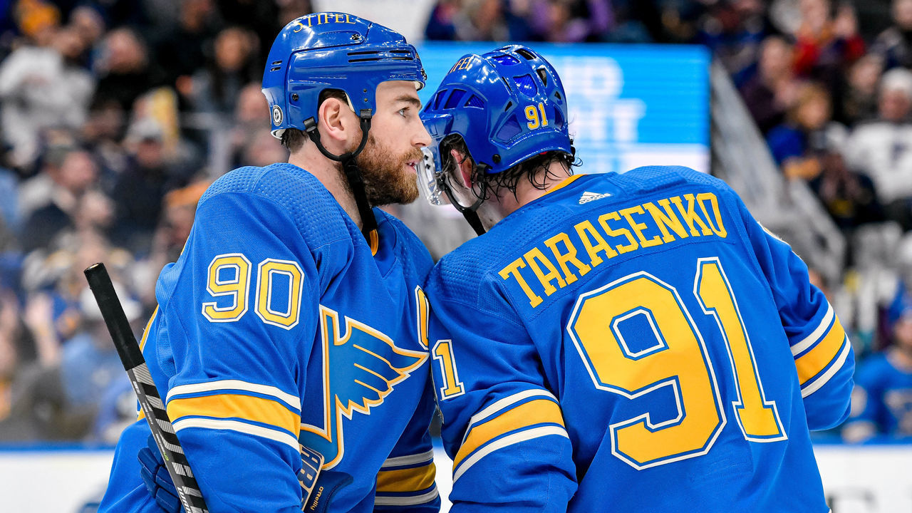 ST. LOUIS, MO - MARCH 26: St. Louis Blues center Ryan O'Reilly (90 talks strategy with St. Louis Blues right wing Vladimir Tarasenko (91) during a game between the Carolina Hurricanes and the St. Louis Blues on March 26, 2022, at the Enterprise Center in St. Louis MO