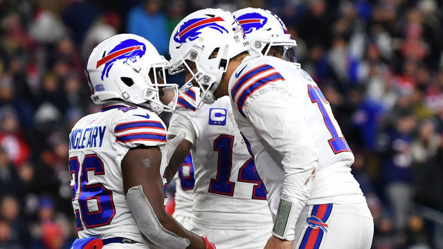 FOXBOROUGH, MASSACHUSETTS - DECEMBER 01: Quarterback Josh Allen #17 celebrates with running back Devin Singletary #26 of the Buffalo Bills after Singletary rushed for a fourth quarter touchdown against the New England Patriots at Gillette Stadium on December 01, 2022 in Foxborough, Massachusetts.