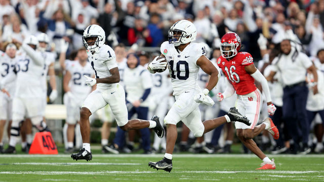 PASADENA, CALIFORNIA - JANUARY 02: Nicholas Singleton #10 of the Penn State Nittany Lions runs with the ball to score a 87 yard touchdown against the Utah Utes during the third quarter in the 2023 Rose Bowl Game at Rose Bowl Stadium on January 02, 2023 in Pasadena, California.