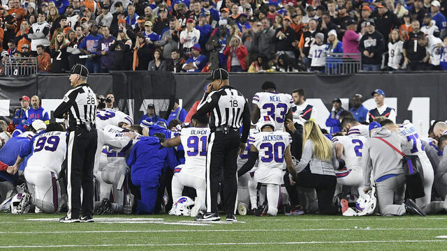 CINCINNATI, OH - JANUARY 02: The Buffalo Bills circle up as play is suspended after Buffalo Bills safety Damar Hamlin (3) collapsed during the NFL football game between the Buffalo Bills and the Cincinnati Bengals on January 2, 2023, at Paycor Stadium in Cincinnati, Ohio.
