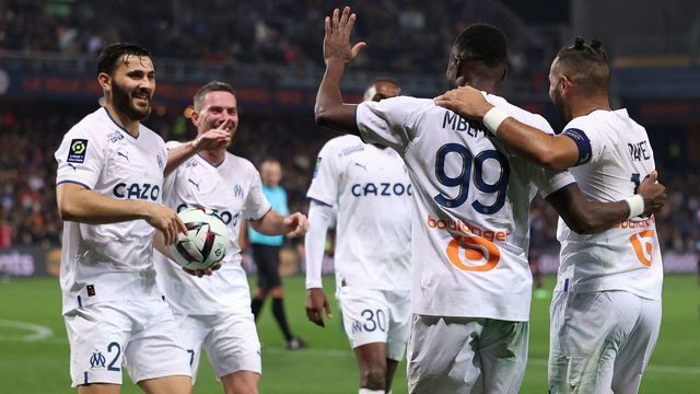 Marseille's Congolese defender Chancel Mbemba (2nd R) celebrates with teammates after scoring his team's second goal during the French L1 football match between Montpellier Herault SC and Olympique de Marseille (OM) at Stade de la Mosson in Montpellier, southern France, on January 2, 2023.
