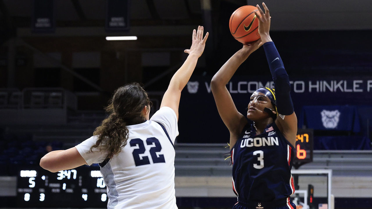 INDIANAPOLIS, INDIANA - JANUARY 03: Aaliyah Edwards #3 of the UConn Huskies takes a shot over Rosemarie Dumont #22 of the Butler Bulldogs at Hinkle Fieldhouse on January 03, 2023 in Indianapolis, Indiana.
