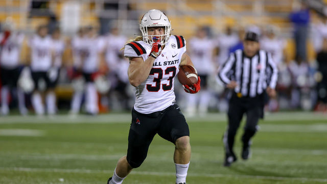 KENT, OH - NOVEMBER 01: Ball State Cardinals running back Carson Steele (33) carries for a 15-yard touchdown during the second quarter of the college football game between the Ball State Cardinals and Kent State Golden Flashes on November 1, 2022, at Dix Stadium in Kent, OH.