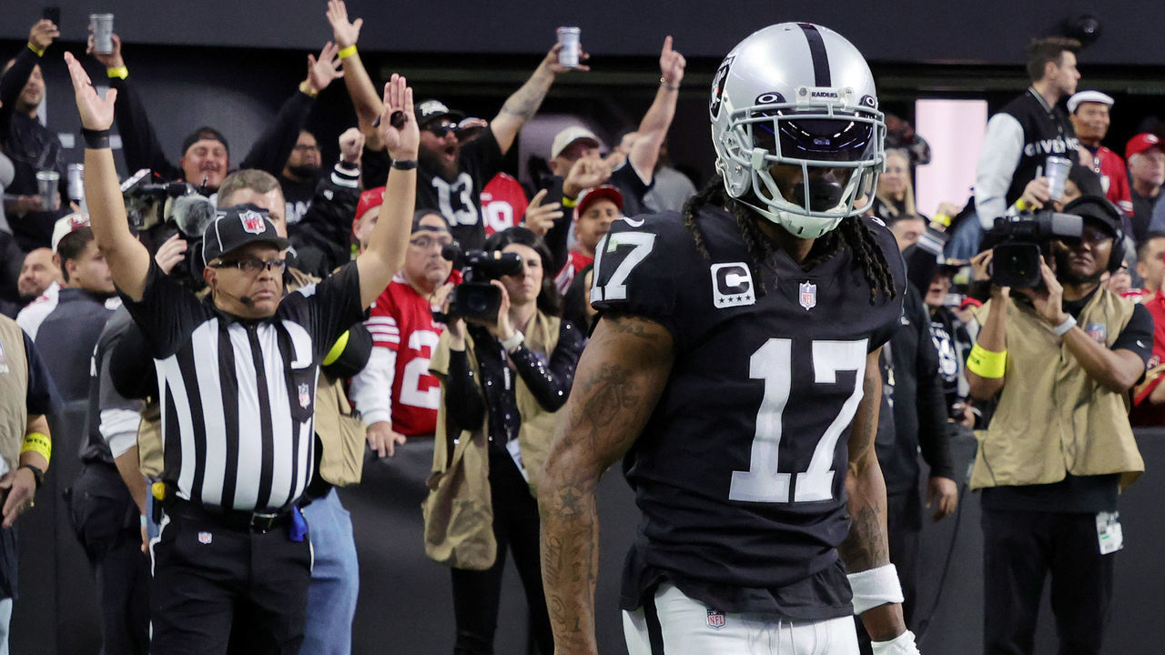 LAS VEGAS, NEVADA - JANUARY 01: Wide receiver Davante Adams #17 of the Las Vegas Raiders reacts after catching a 4-yard touchdown pass against the San Francisco 49ers in the second quarter of their game at Allegiant Stadium on January 01, 2023 in Las Vegas, Nevada. The 49ers defeated the Raiders 37-34 in overtime.