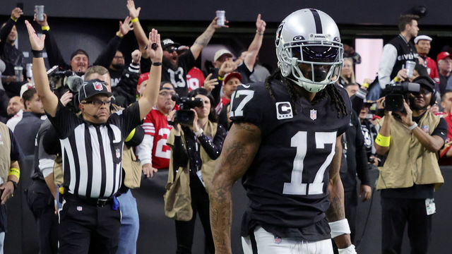 LAS VEGAS, NEVADA - JANUARY 01: Wide receiver Davante Adams #17 of the Las Vegas Raiders reacts after catching a 4-yard touchdown pass against the San Francisco 49ers in the second quarter of their game at Allegiant Stadium on January 01, 2023 in Las Vegas, Nevada. The 49ers defeated the Raiders 37-34 in overtime.