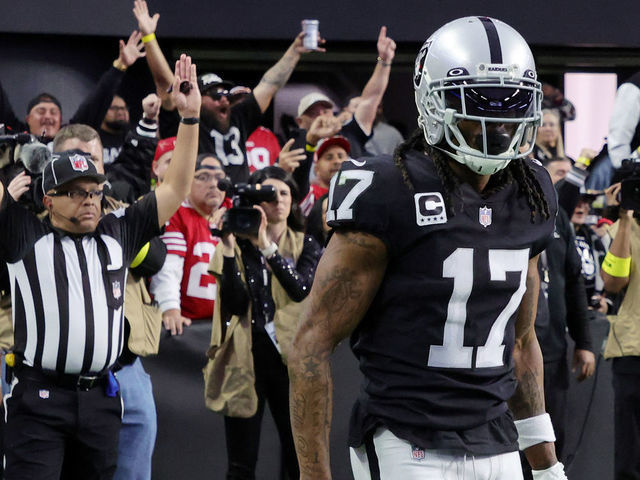 LAS VEGAS, NEVADA - JANUARY 01: Wide receiver Davante Adams #17 of the Las Vegas Raiders reacts after catching a 4-yard touchdown pass against the San Francisco 49ers in the second quarter of their game at Allegiant Stadium on January 01, 2023 in Las Vegas, Nevada. The 49ers defeated the Raiders 37-34 in overtime.