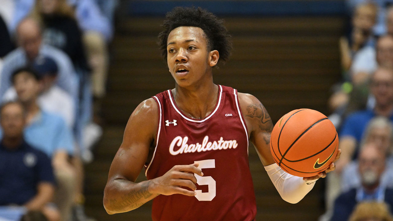 CHAPEL HILL, NORTH CAROLINA - NOVEMBER 11: Raekwon Horton #5 of the Charleston Cougars moves the ball against the North Carolina Tar Heels during their game at the Dean E. Smith Center on November 11, 2022 in Chapel Hill, North Carolina. North Carolina won 102-86.