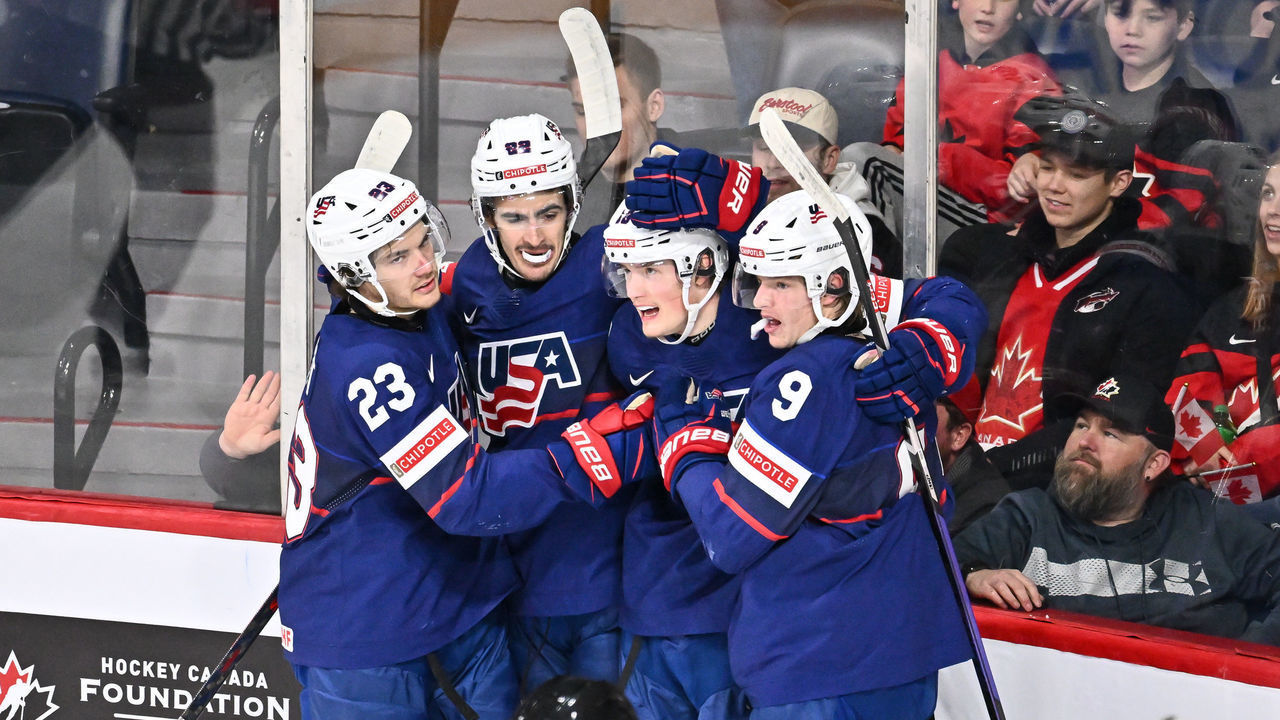 HALIFAX, CANADA - JANUARY 05: Chaz Lucius #16 of Team United States celebrates his goal with teammates Jack Peart #23, Sam Lipkin #22 and Jackson Blake #9 during the second period against Team Sweden in the bronze medal round of the 2023 IIHF World Junior Championship at Scotiabank Centre on January 5, 2023 in Halifax, Nova Scotia, Canada.